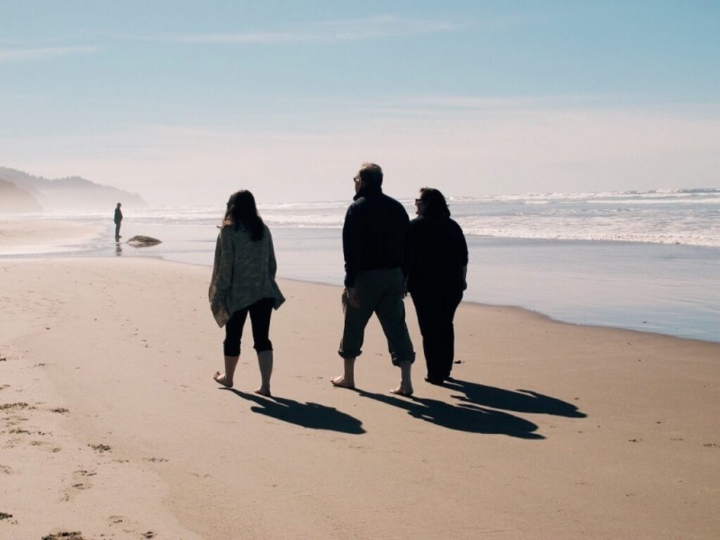People walking on a beach representing Estate Planning