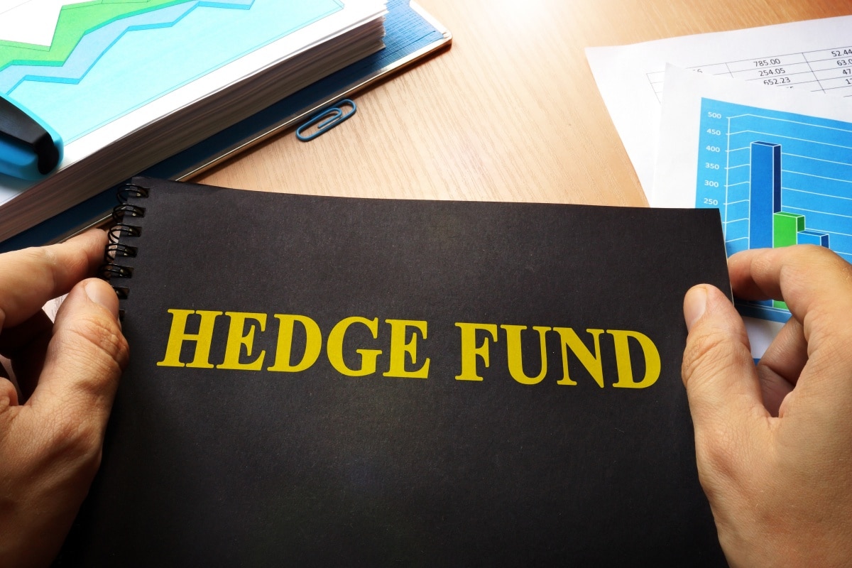 Black folder with Hedge Fund written across the top