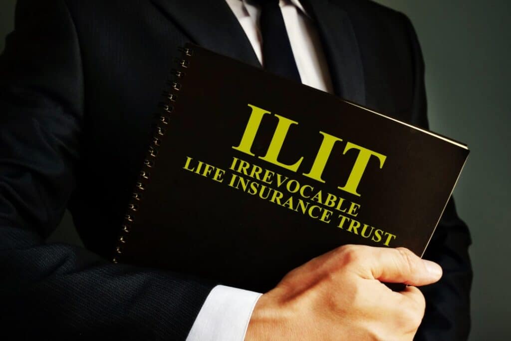 Man holds Irrevocable Life Insurance Trust ILIT policy.